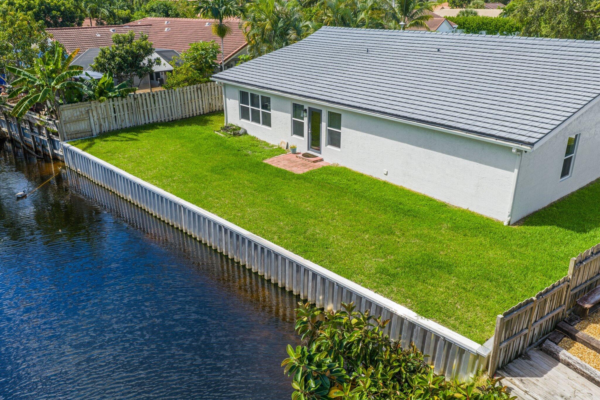 6940 Northwest 4th Avenue Boca Raton, FL 33487 - Photo 35 of 37 Brand New Seawall