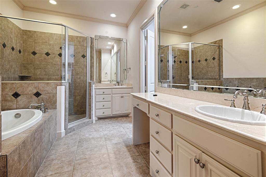 8329 Moore Street Frisco, TX 75034 - Photo 28 of 30 Full bathroom with two vanities, a bath, ornamental molding, recessed lighting, and a stall shower