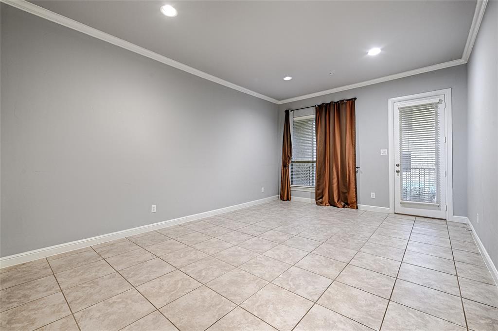 8329 Moore Street Frisco, TX 75034 - Photo 9 of 30 Unfurnished room with crown molding, recessed lighting, and light tile patterned flooring
