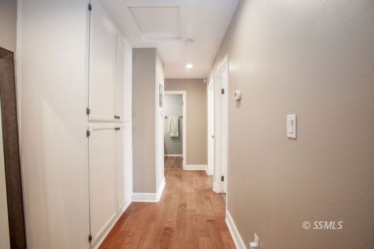 421 Christopher Court Ridgecrest, CA 93555 - Photo 34 of 50 a view of a hallway with wooden floor