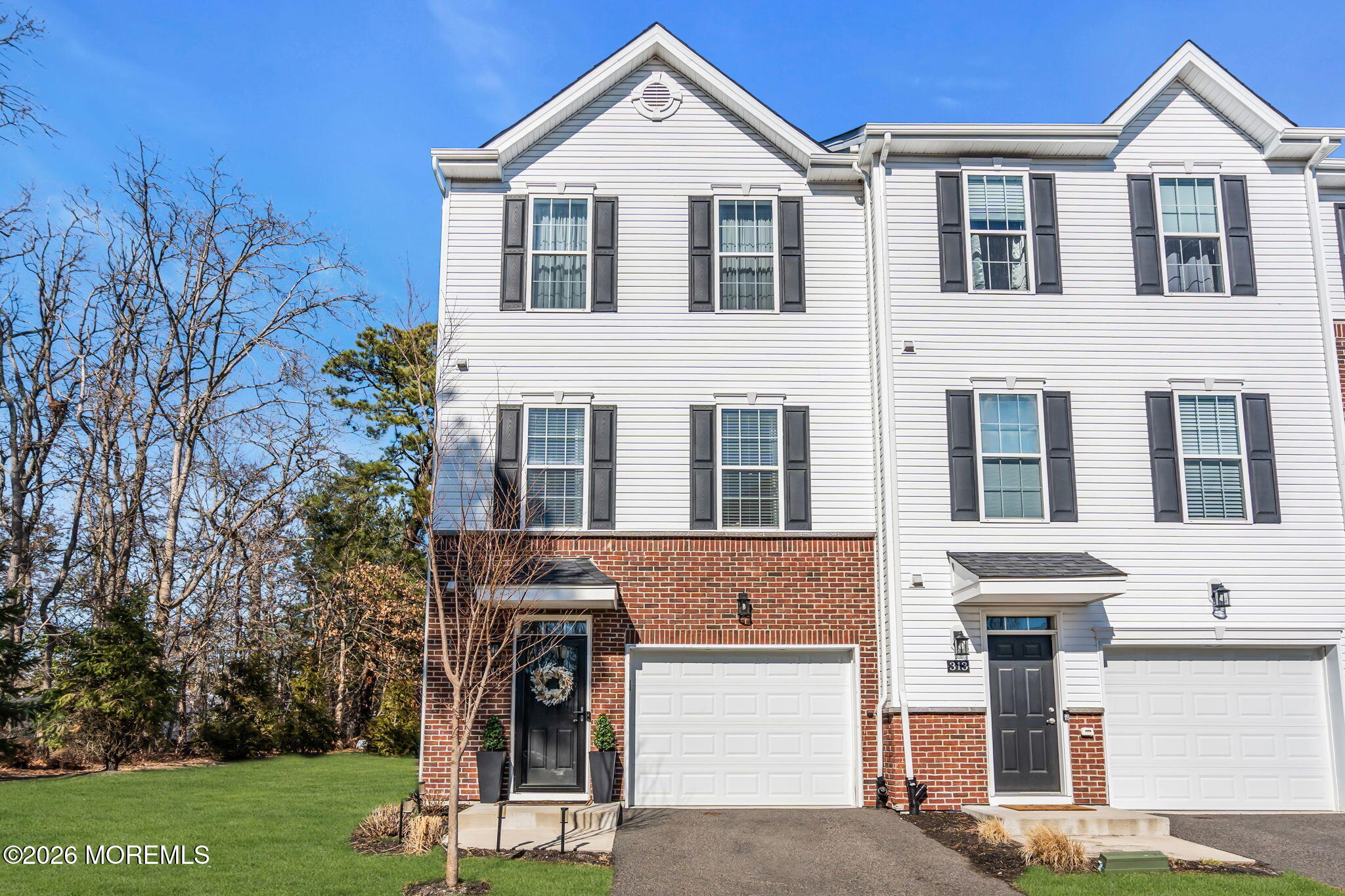 315 Prosper Way Brick, NJ 08723 - Photo 16 of 36 a front view of a house with a yard