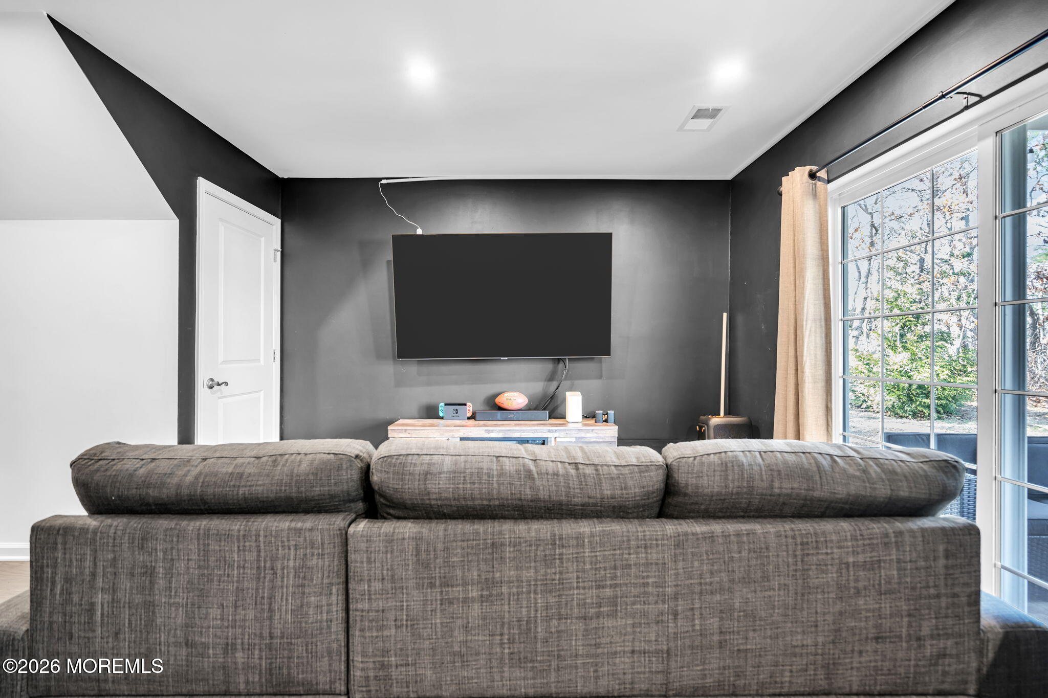 315 Prosper Way Brick, NJ 08723 - Photo 22 of 36 a living room with couches and a flat screen tv