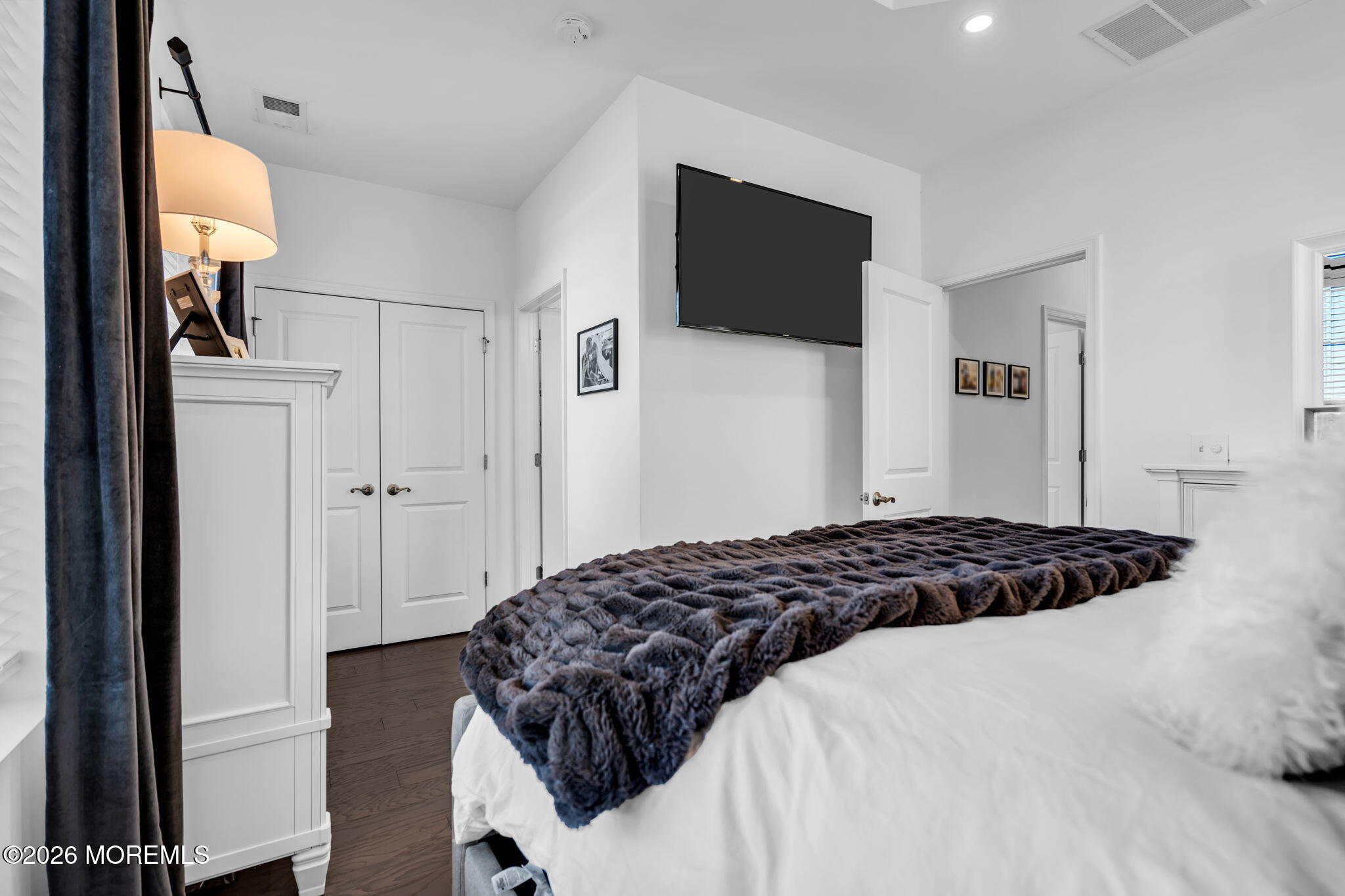 315 Prosper Way Brick, NJ 08723 - Photo 27 of 36 a bedroom with a bed and a flat screen tv