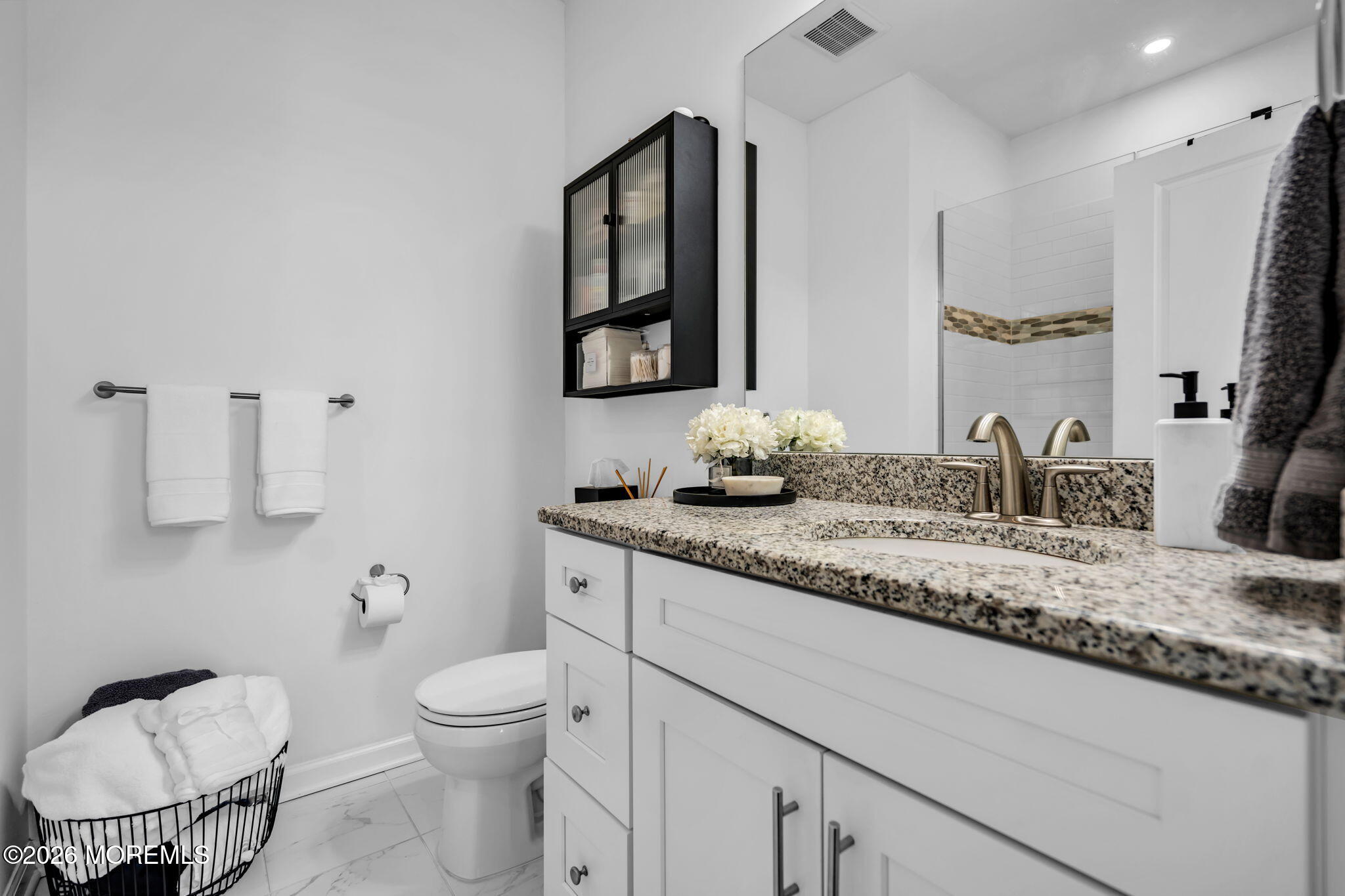 315 Prosper Way Brick, NJ 08723 - Photo 28 of 36 a bathroom with a granite countertop toilet sink and mirror
