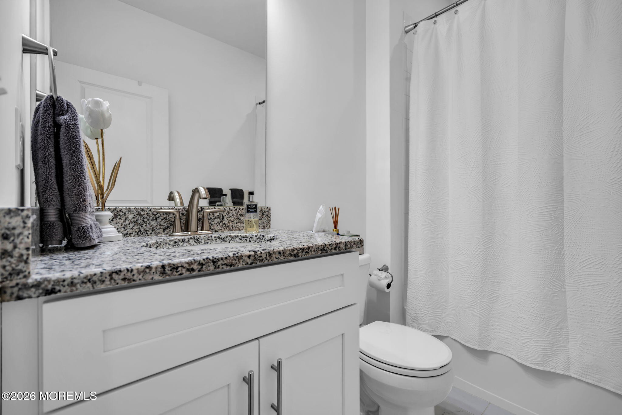 315 Prosper Way Brick, NJ 08723 - Photo 30 of 36 a bathroom with a granite countertop sink toilet and a mirror