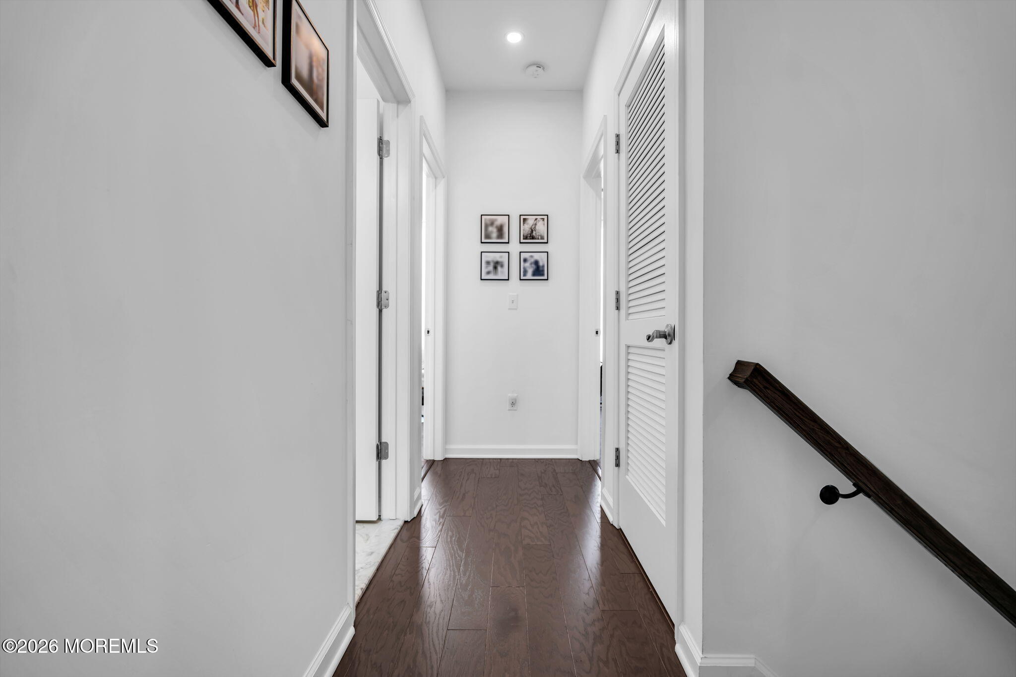 315 Prosper Way Brick, NJ 08723 - Photo 32 of 36 a view of a hallway with wooden floor and staircase