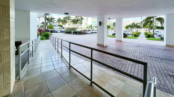 a view of a building with a yard