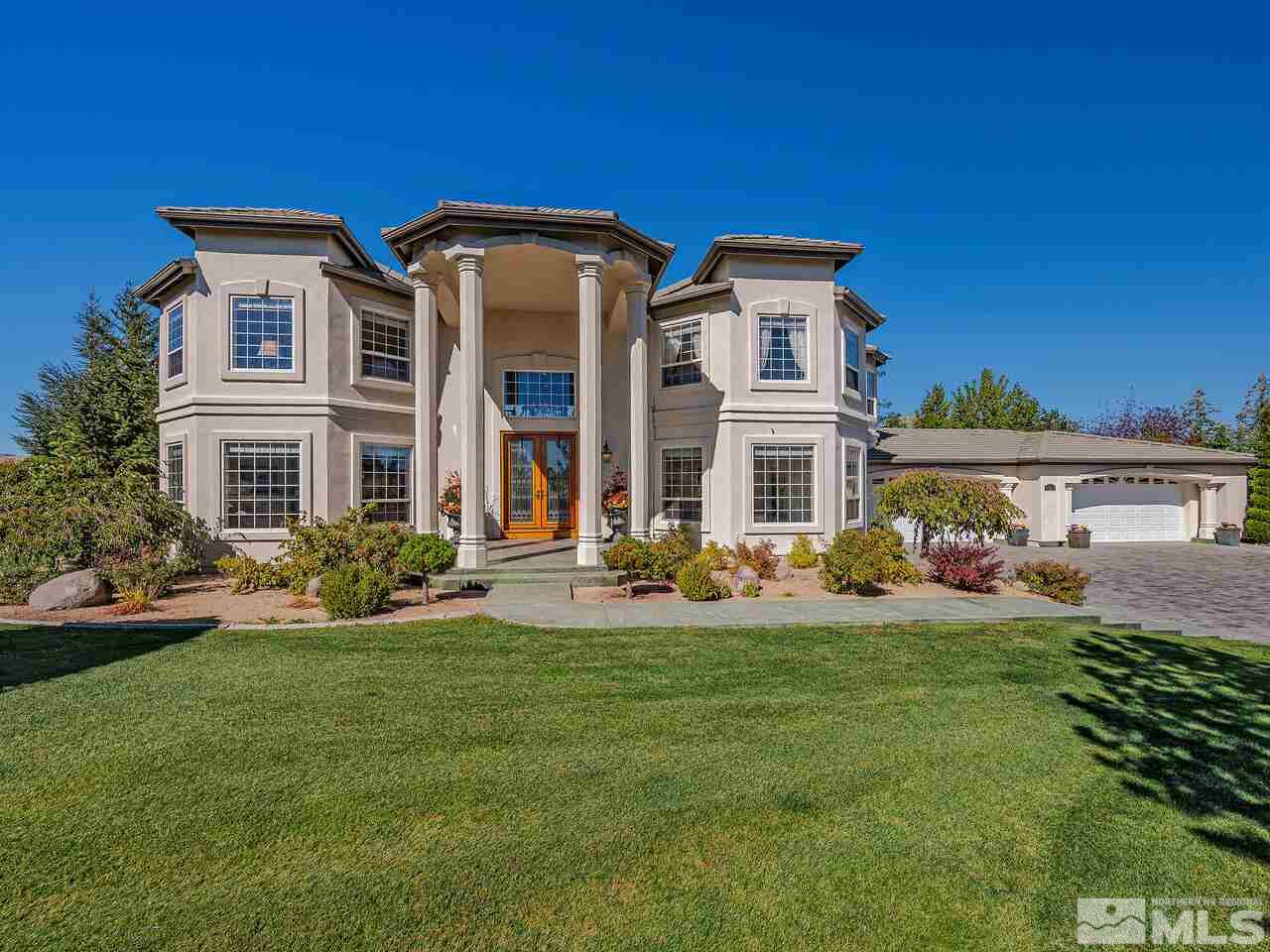 13215 West Saddlebow Drive Reno, NV 89511 - Photo 1 of 32 a front view of house with yard