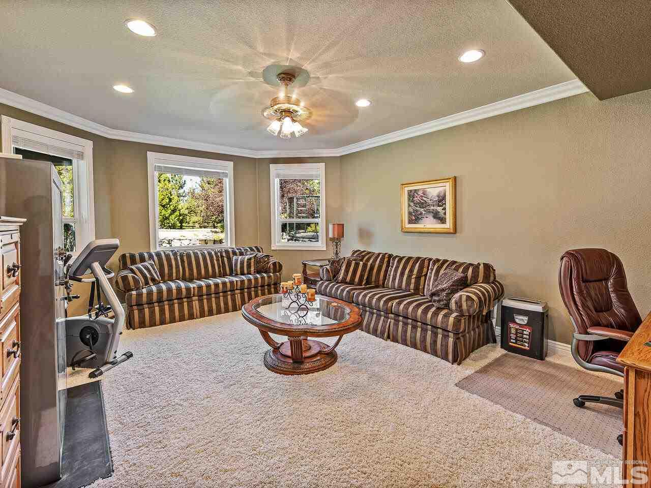 13215 West Saddlebow Drive Reno, NV 89511 - Photo 15 of 32 a living room with furniture