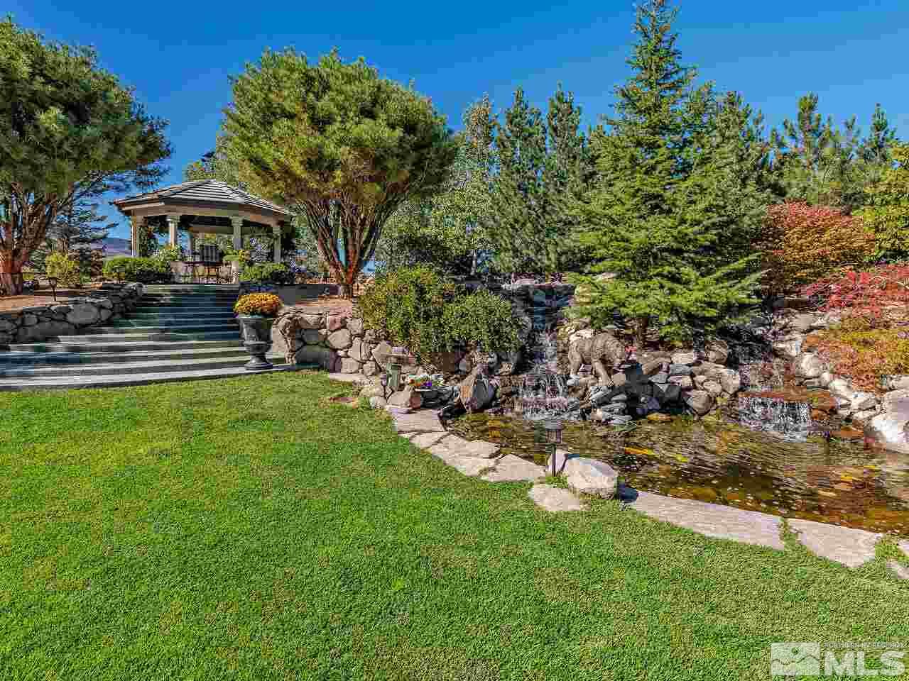 13215 West Saddlebow Drive Reno, NV 89511 - Photo 5 of 32 a view of a yard with plants and a patio