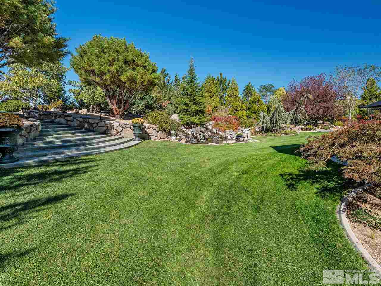 13215 West Saddlebow Drive Reno, NV 89511 - Photo 6 of 32 a view of a park with large trees