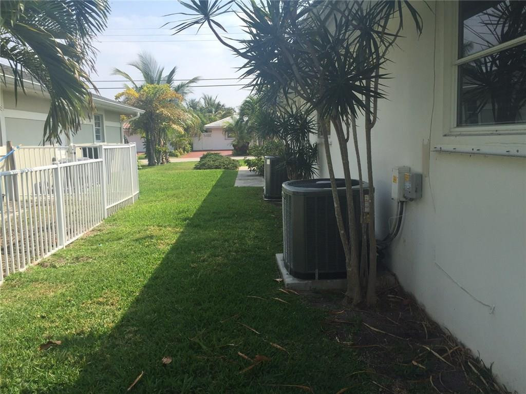1331 Southwest 5th Court Boca Raton, FL 33432 - Photo 16 of 18 North Side of House 1 New AC