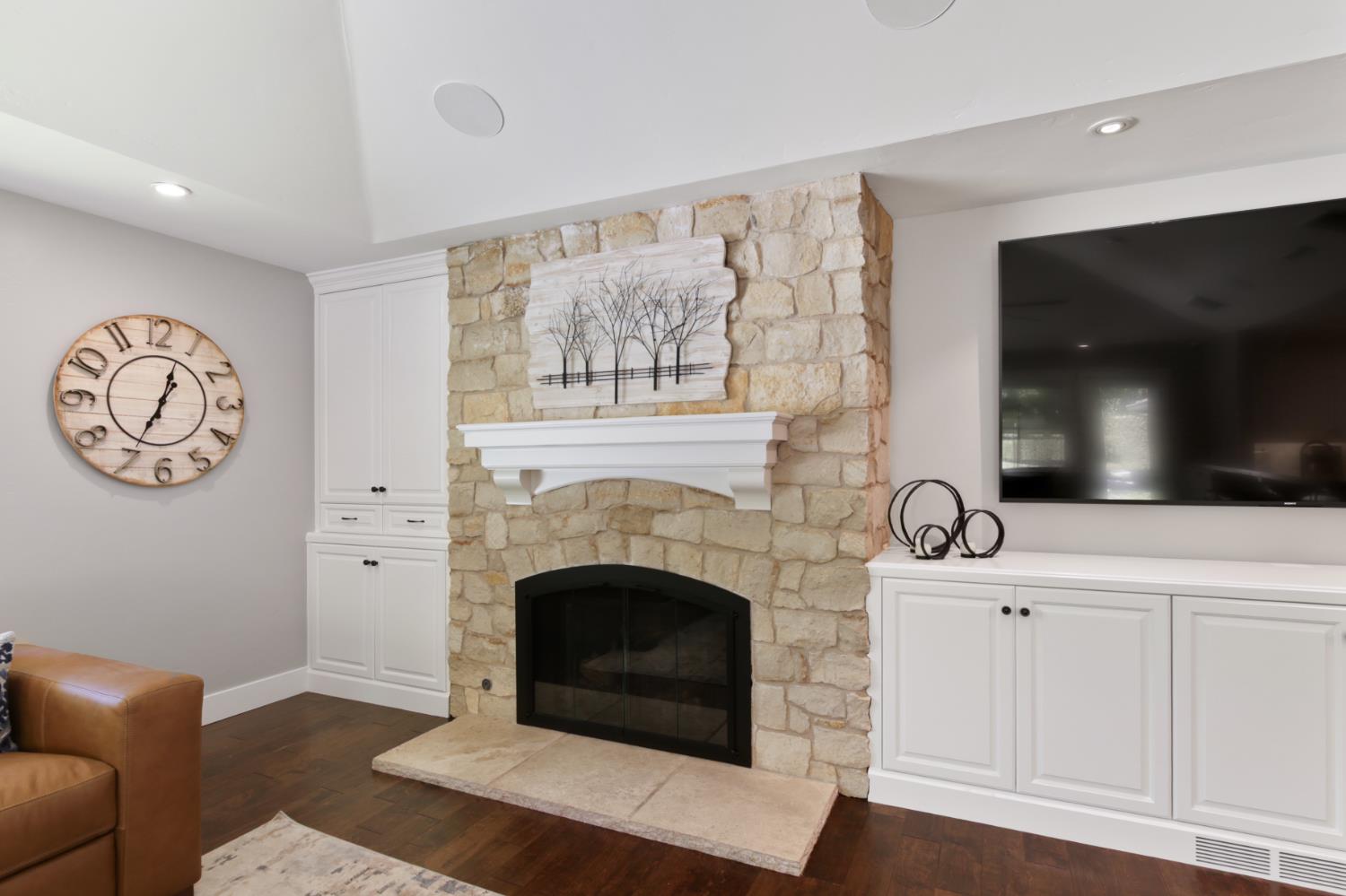 495 Bret Harte Road Sacramento, CA 95864 - Photo 17 of 84 a living room with furniture a fireplace and a flat screen tv
