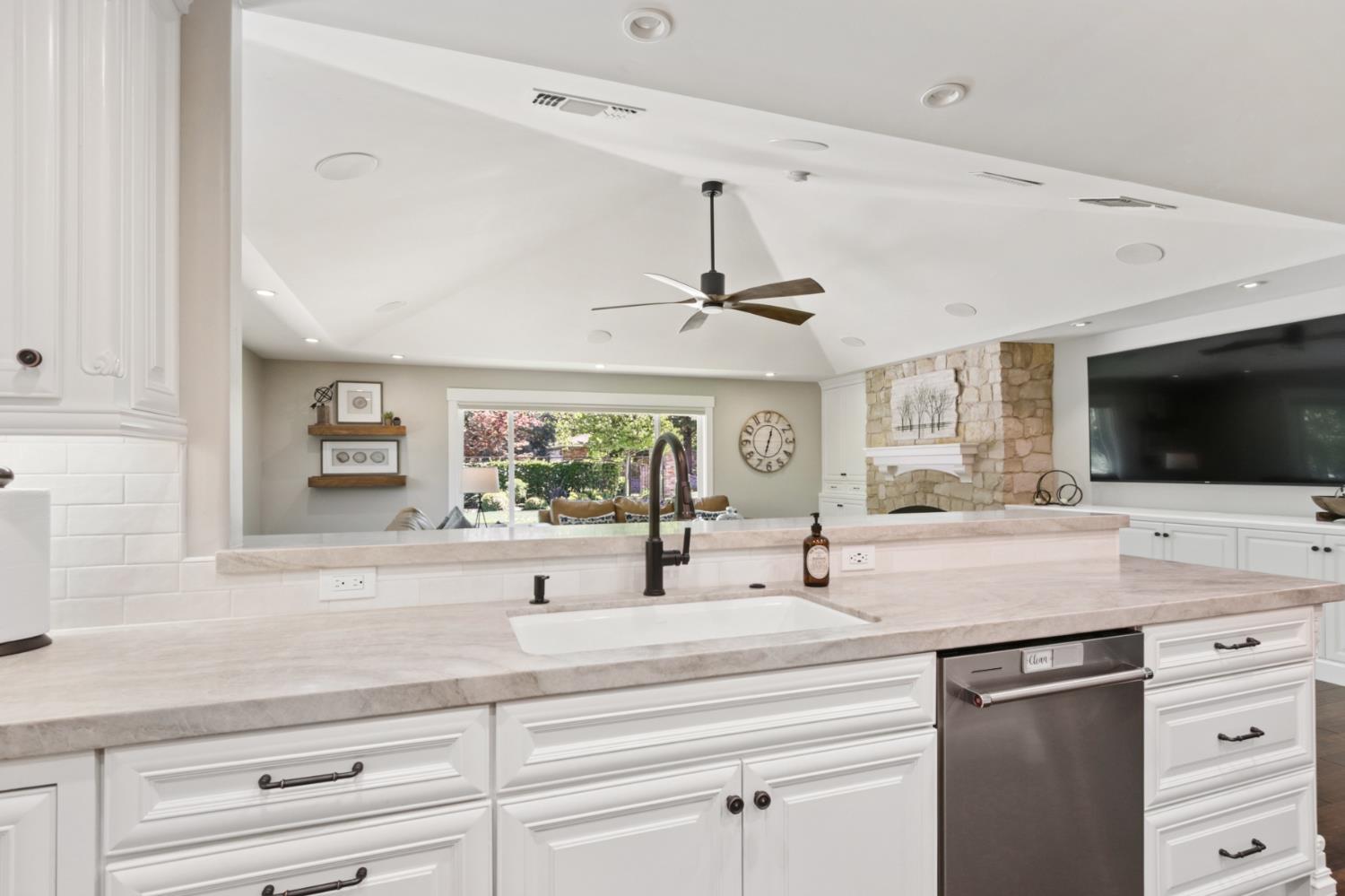 495 Bret Harte Road Sacramento, CA 95864 - Photo 24 of 84 a kitchen with stainless steel appliances a sink and a large window