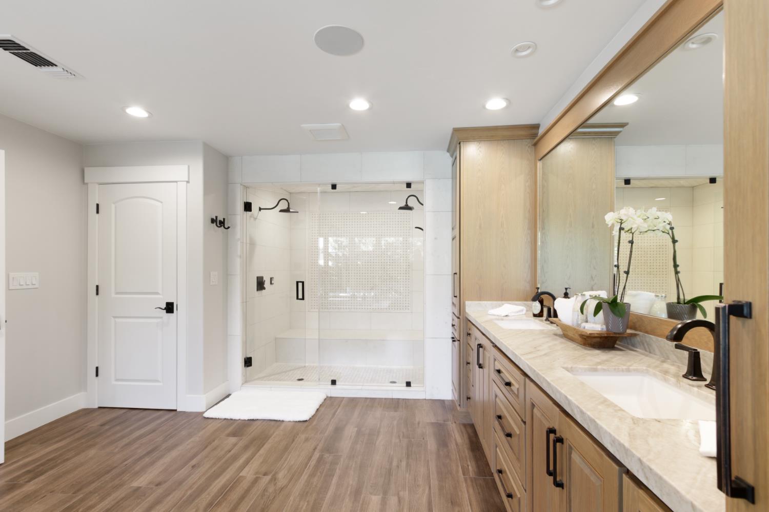 495 Bret Harte Road Sacramento, CA 95864 - Photo 30 of 84 a spacious bathroom with double vanity and a shower