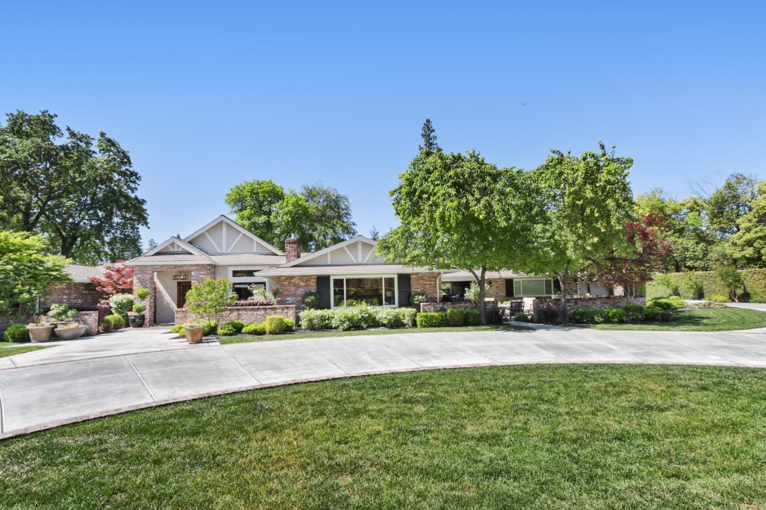 495 Bret Harte Road Sacramento, CA 95864 - Photo 74 of 84 a front view of a house with a yard and trees