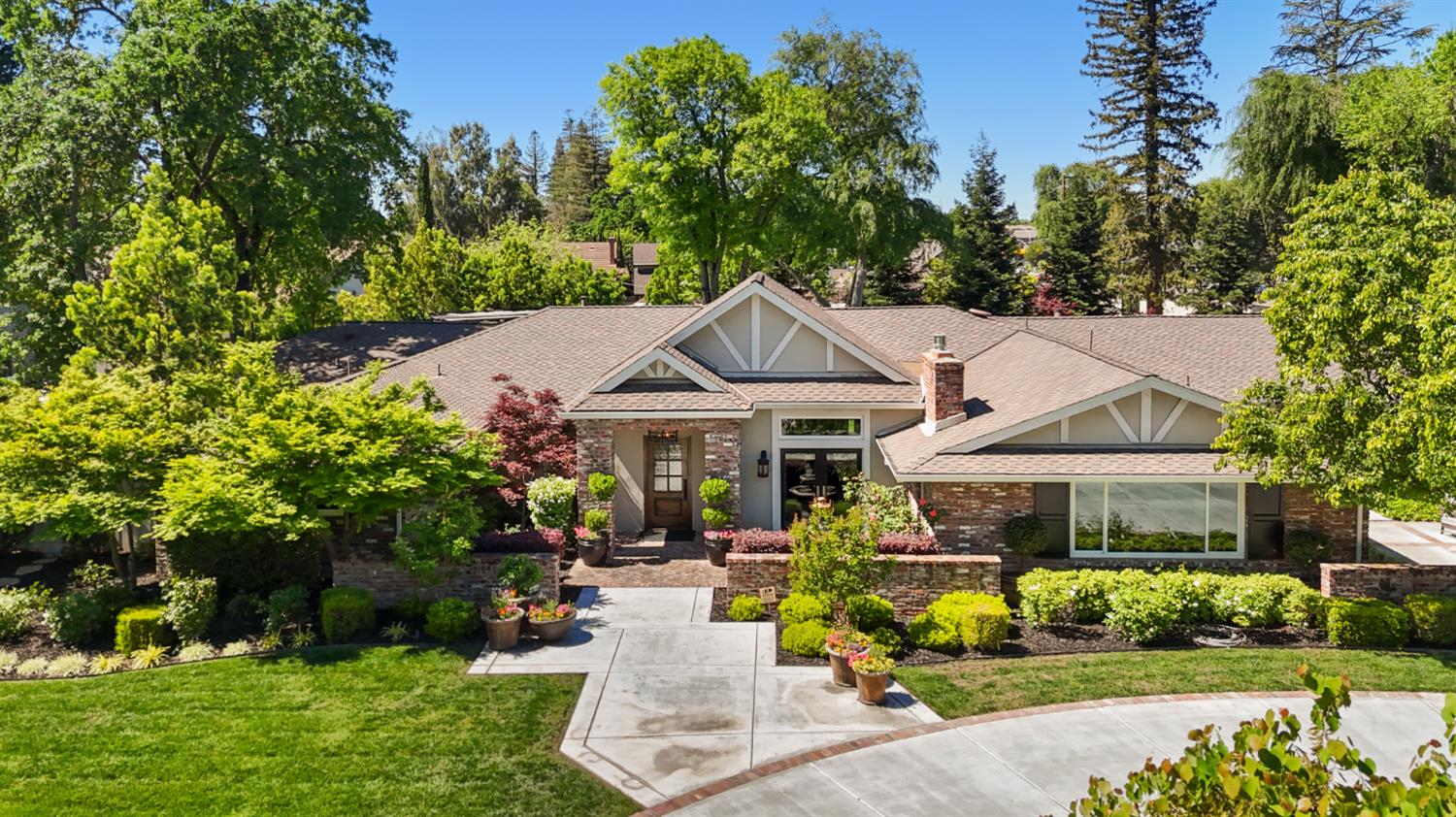 495 Bret Harte Road Sacramento, CA 95864 - Photo 77 of 84 a front view of a house with garden and sitting area