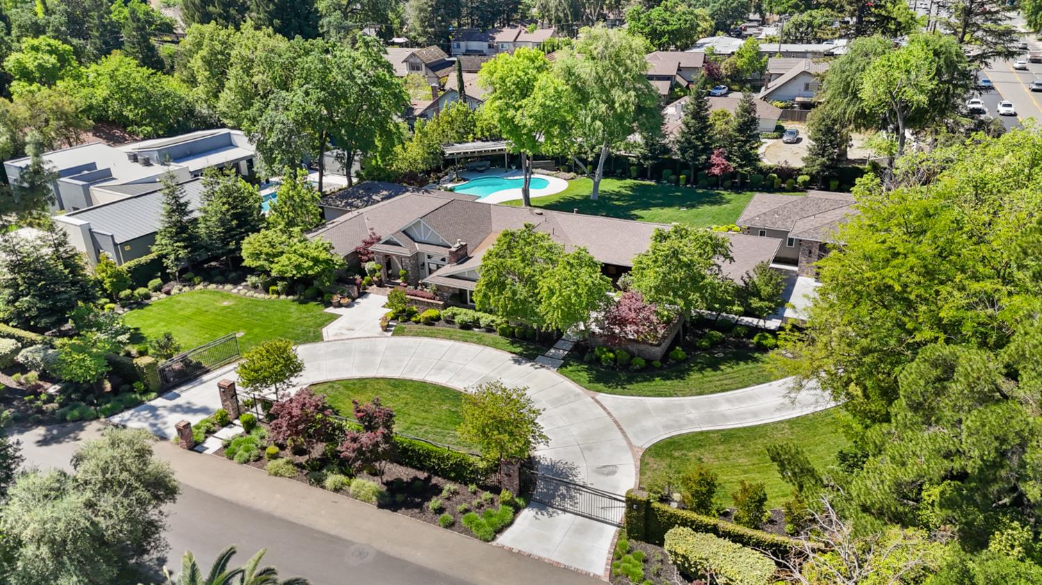 495 Bret Harte Road Sacramento, CA 95864 - Photo 78 of 84 an aerial view of a house with a garden and lake view