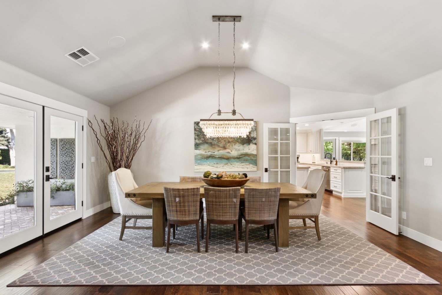 495 Bret Harte Road Sacramento, CA 95864 - Photo 10 of 84 a dining room with furniture wooden floor and a rug