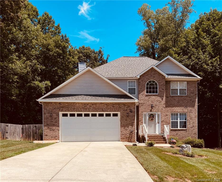 1173 Timber Spring Lane Salisbury, NC 28147 - Photo 1 of 38 a front view of a house with a yard