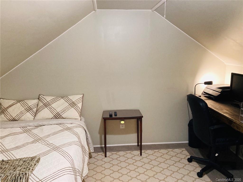 1173 Timber Spring Lane Salisbury, NC 28147 - Photo 31 of 38 a bedroom with a bed and a desk