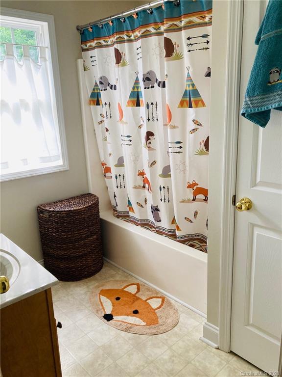 1173 Timber Spring Lane Salisbury, NC 28147 - Photo 33 of 38 a room with toys and a window