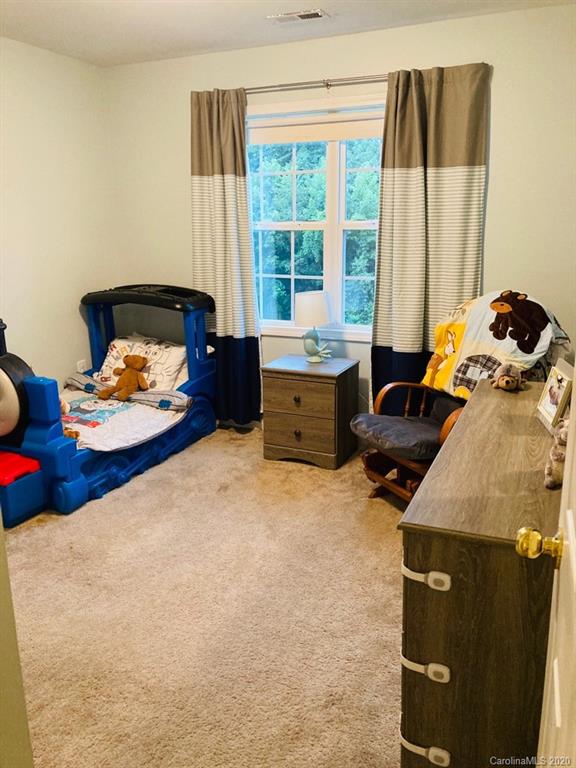 1173 Timber Spring Lane Salisbury, NC 28147 - Photo 34 of 38 a bedroom with furniture and a window