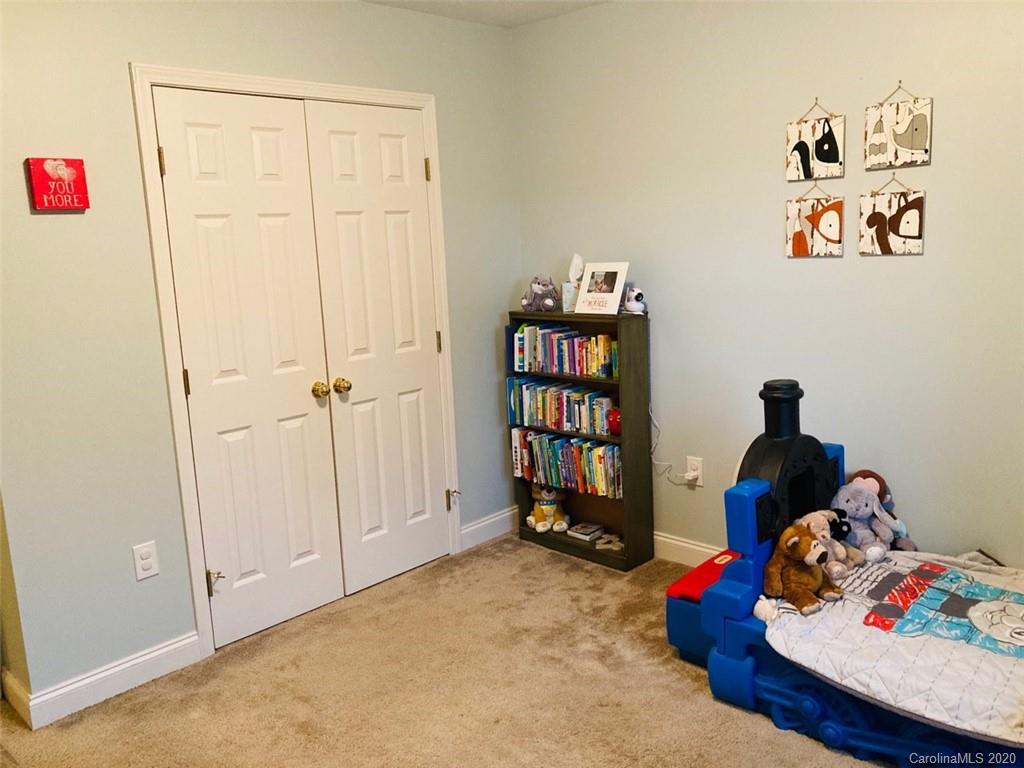1173 Timber Spring Lane Salisbury, NC 28147 - Photo 35 of 38 a room with toys and dresser