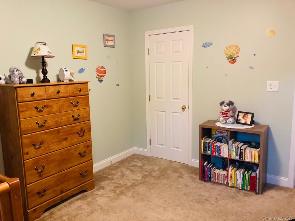 1173 Timber Spring Lane Salisbury, NC 28147 - Photo 36 of 38 a room with toys and dresser