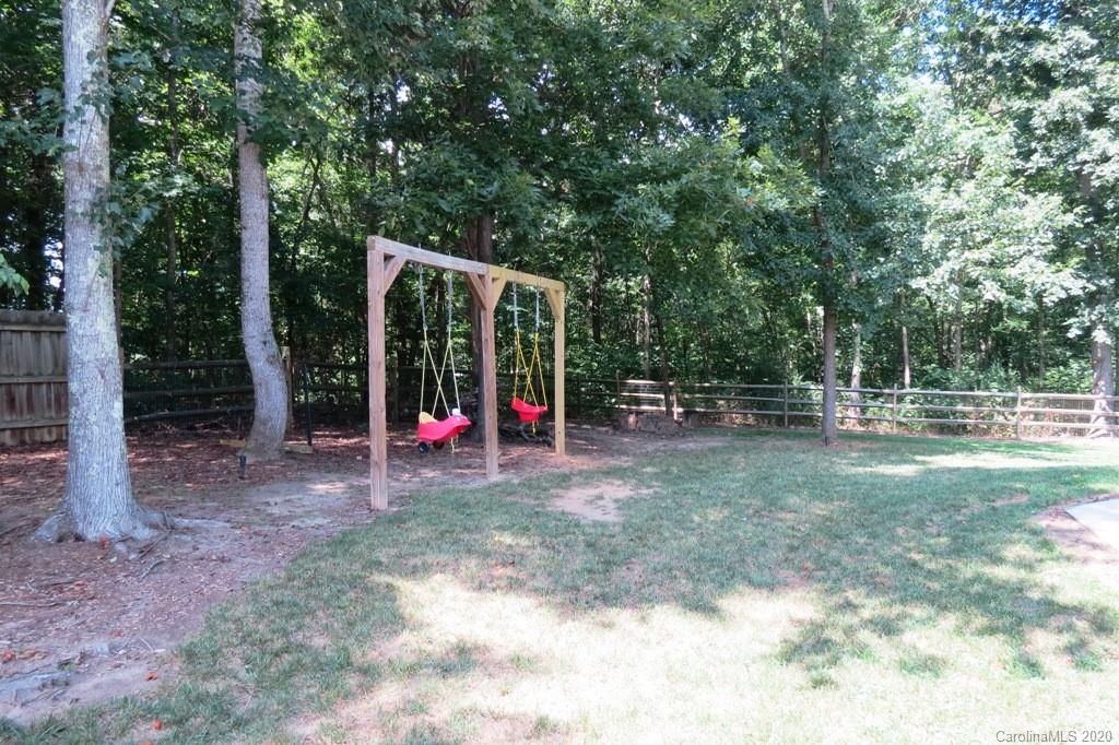 1173 Timber Spring Lane Salisbury, NC 28147 - Photo 5 of 38 a view of a park with swings and slides