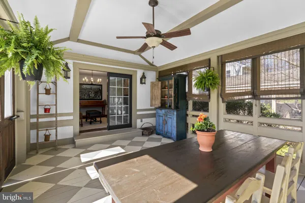 a view of a living room and a porch