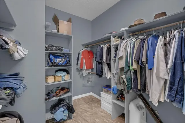 a view of a street with houses on both side