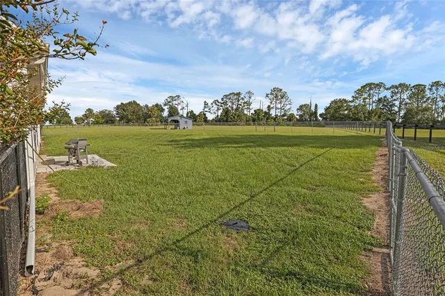 a view of a pool an ocean view