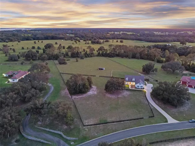 a view of a house with a big yard