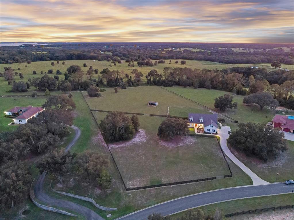 5608 Strong Point Weirsdale, FL 32195 - Photo 53 of 71 a view of a city with ocean