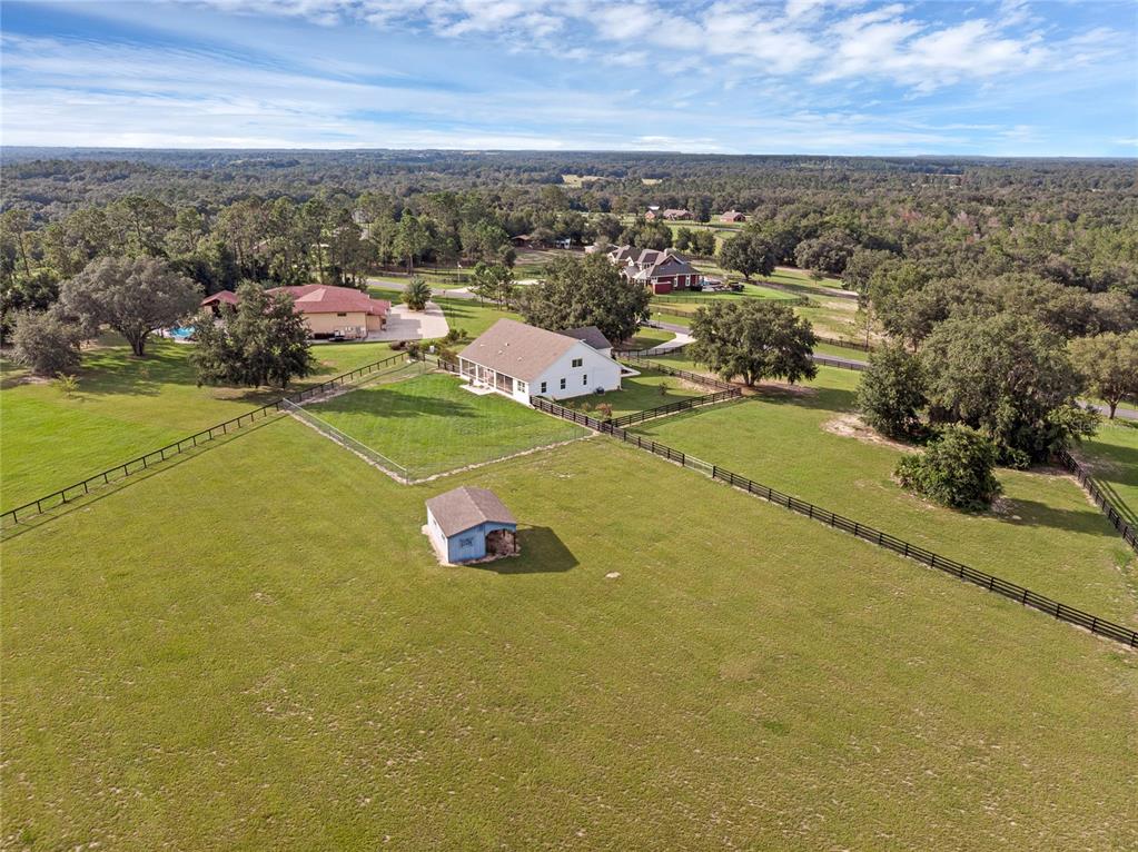 5608 Strong Point Weirsdale, FL 32195 - Photo 64 of 71 an aerial view of a city