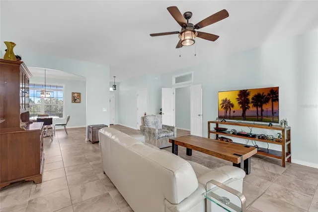 a kitchen with stainless steel appliances granite countertop a stove top oven a sink a counter top space and cabinets