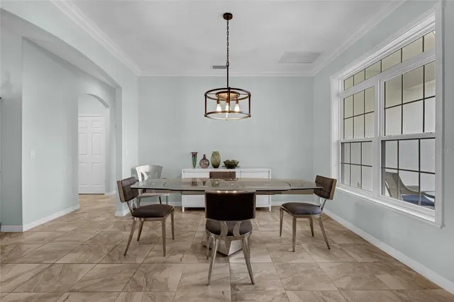 a kitchen that has a sink and a stove