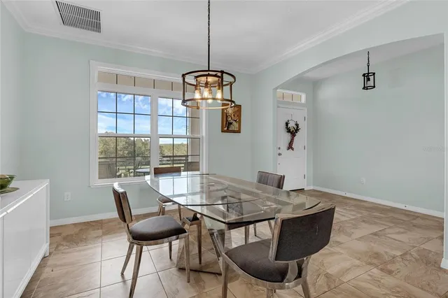 a spacious bedroom with a large bed and a window