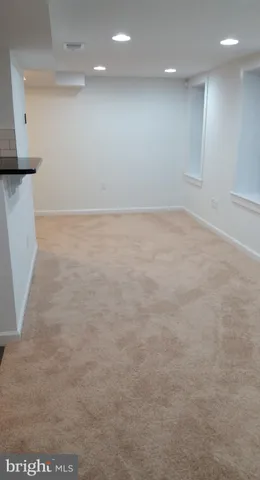a bathroom with a toilet a sink and bathtub