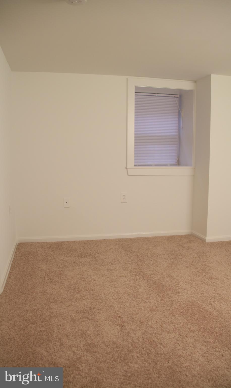 1438 Meridian Place Northwest, Unit LL4 Washington, DC 20010 - Photo 7 of 7 a view of an empty room