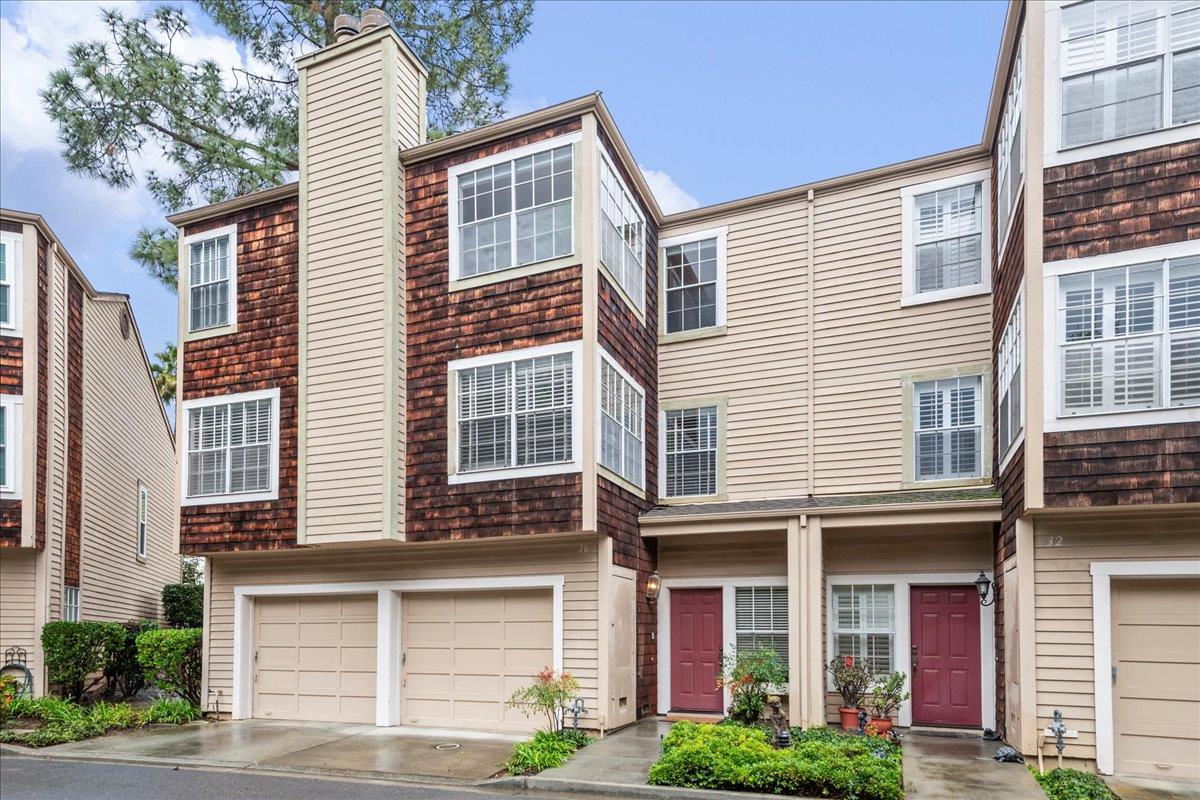 a front view of a house with a garage