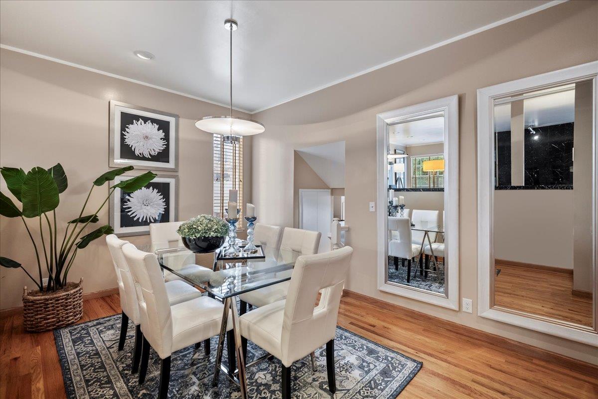 36 Holmes Drive San Jose, CA 95127 - Photo 13 of 29 a dining room with furniture a rug and wooden floor