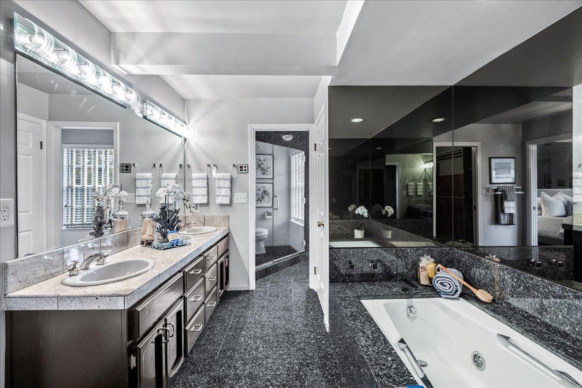 36 Holmes Drive San Jose, CA 95127 - Photo 20 of 29 a large bathroom with a granite countertop sink a large mirror and a bathtub