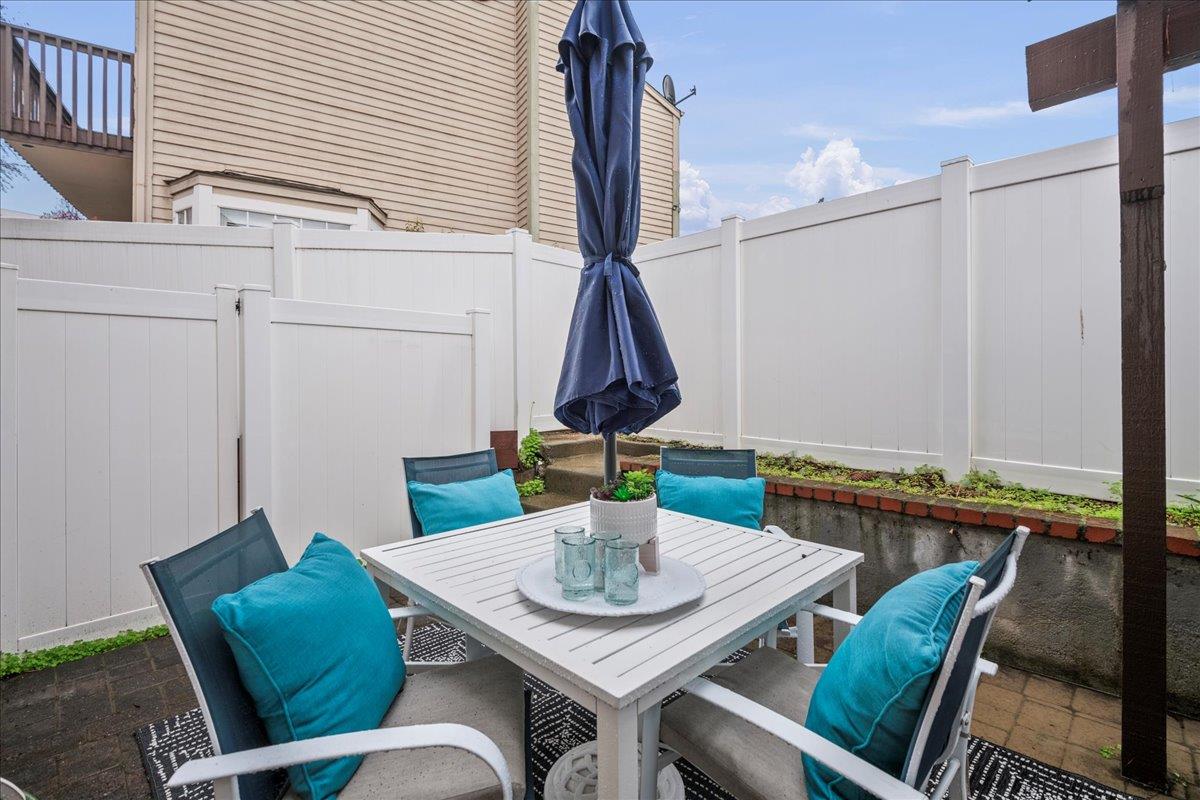 36 Holmes Drive San Jose, CA 95127 - Photo 27 of 29 a view of a dining room with furniture one side and wooden floor
