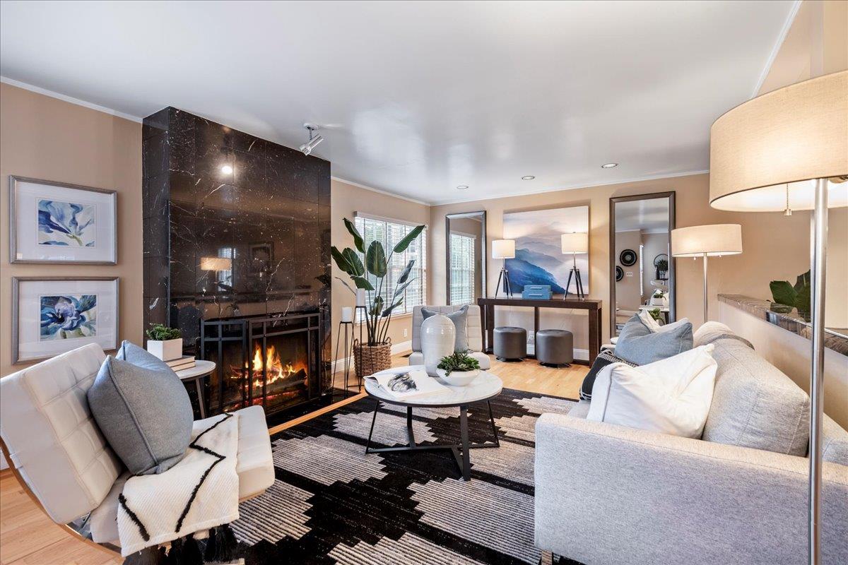 36 Holmes Drive San Jose, CA 95127 - Photo 8 of 29 a living room with furniture a lamp and a fireplace