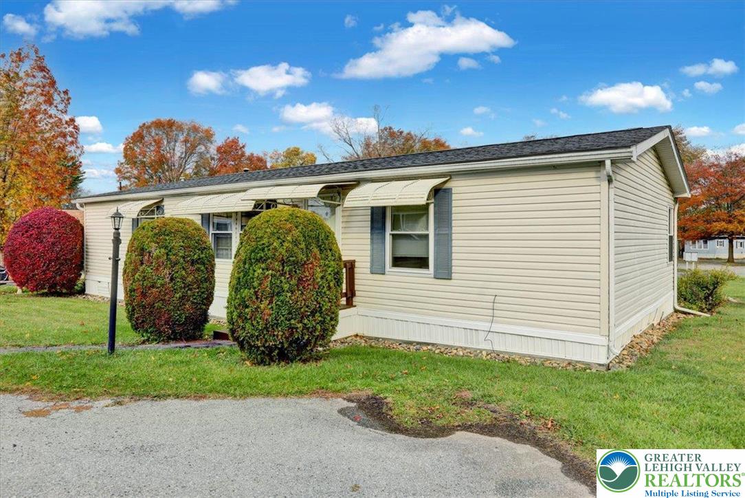 8758 Turkey Ridge Road, Unit 180 Breinigsville, PA 18031 - Photo 3 of 28 a view of a backyard