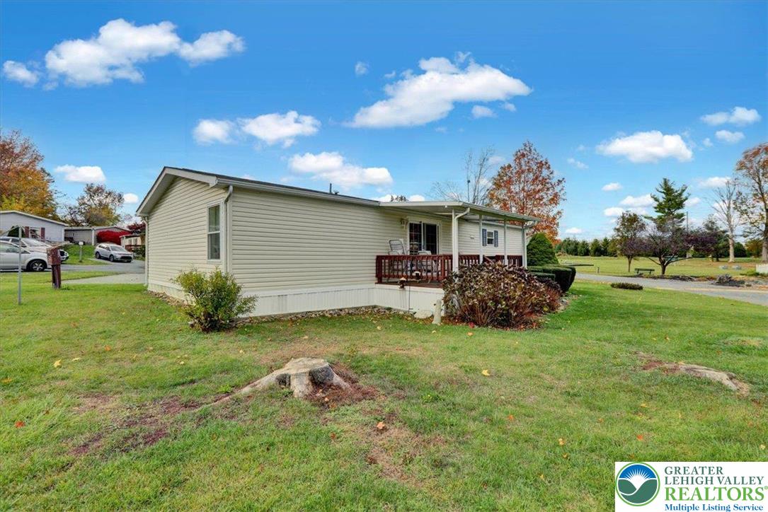 8758 Turkey Ridge Road, Unit 180 Breinigsville, PA 18031 - Photo 4 of 28 a view of a house with backyard