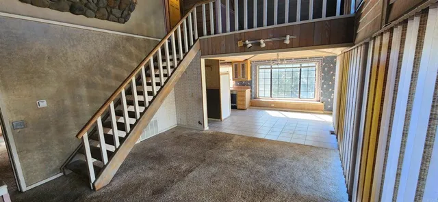 a view of an entryway with staircase