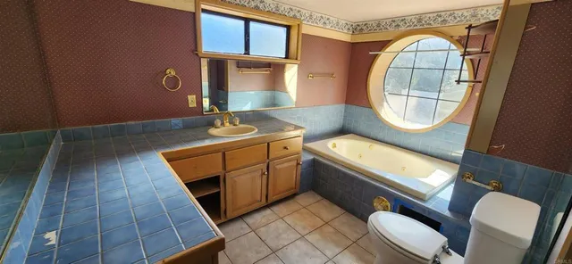 a view of balcony with wooden floor and fence